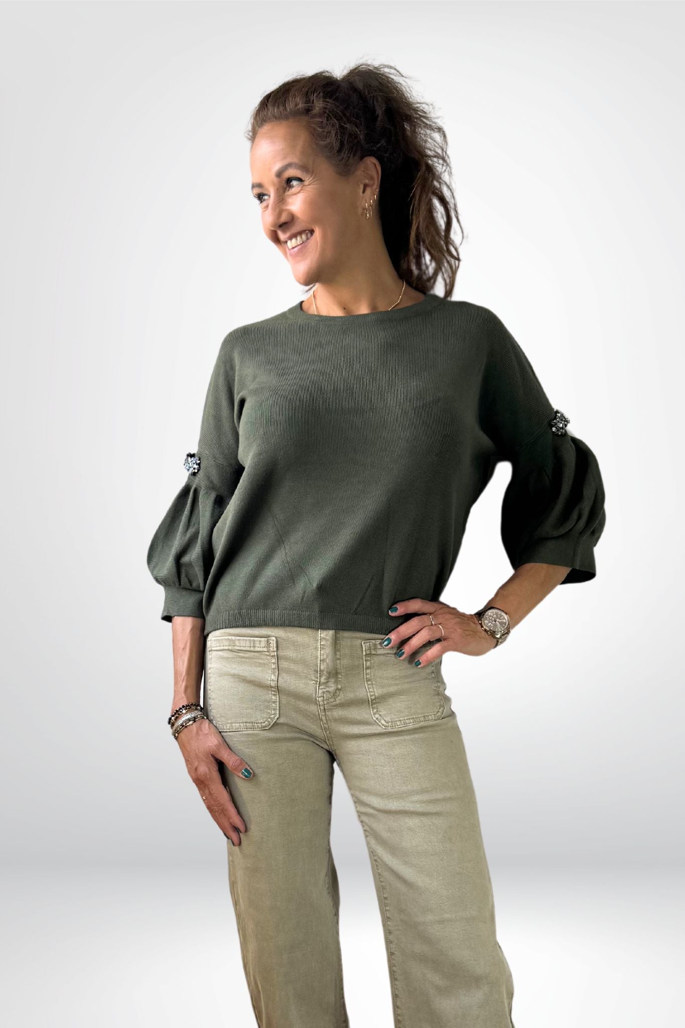 Gebreide trui met pofmouwen en strass-steentjes